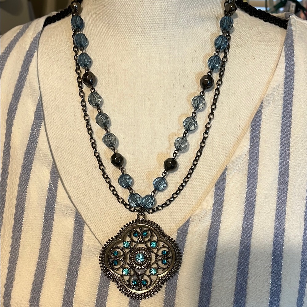 Elegant Blue Beaded Necklace with Intricate Pendant